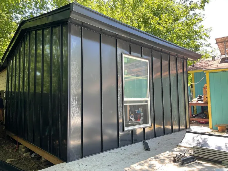 Black standing seam metal wall panels for Metal Roof Installation in Brownfields