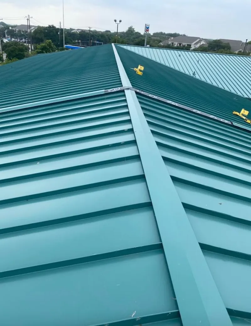 Green commercial metal roof ridge and valley for Metal Roof Repair in Brownfields