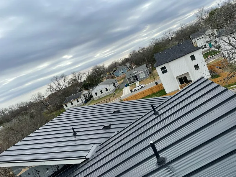 Standing seam metal roof panels with vents for Skylight Repair in Brownfields